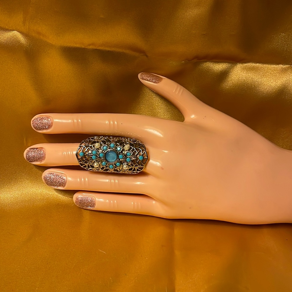 Gold colored ring with faux pearls & blue gems.size 7-Costume jewelry